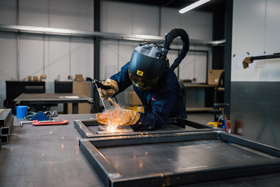 A fabrication & welding apprentice in the workshop