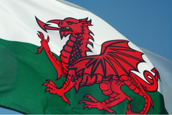 A Welsh flag blowing in the wind