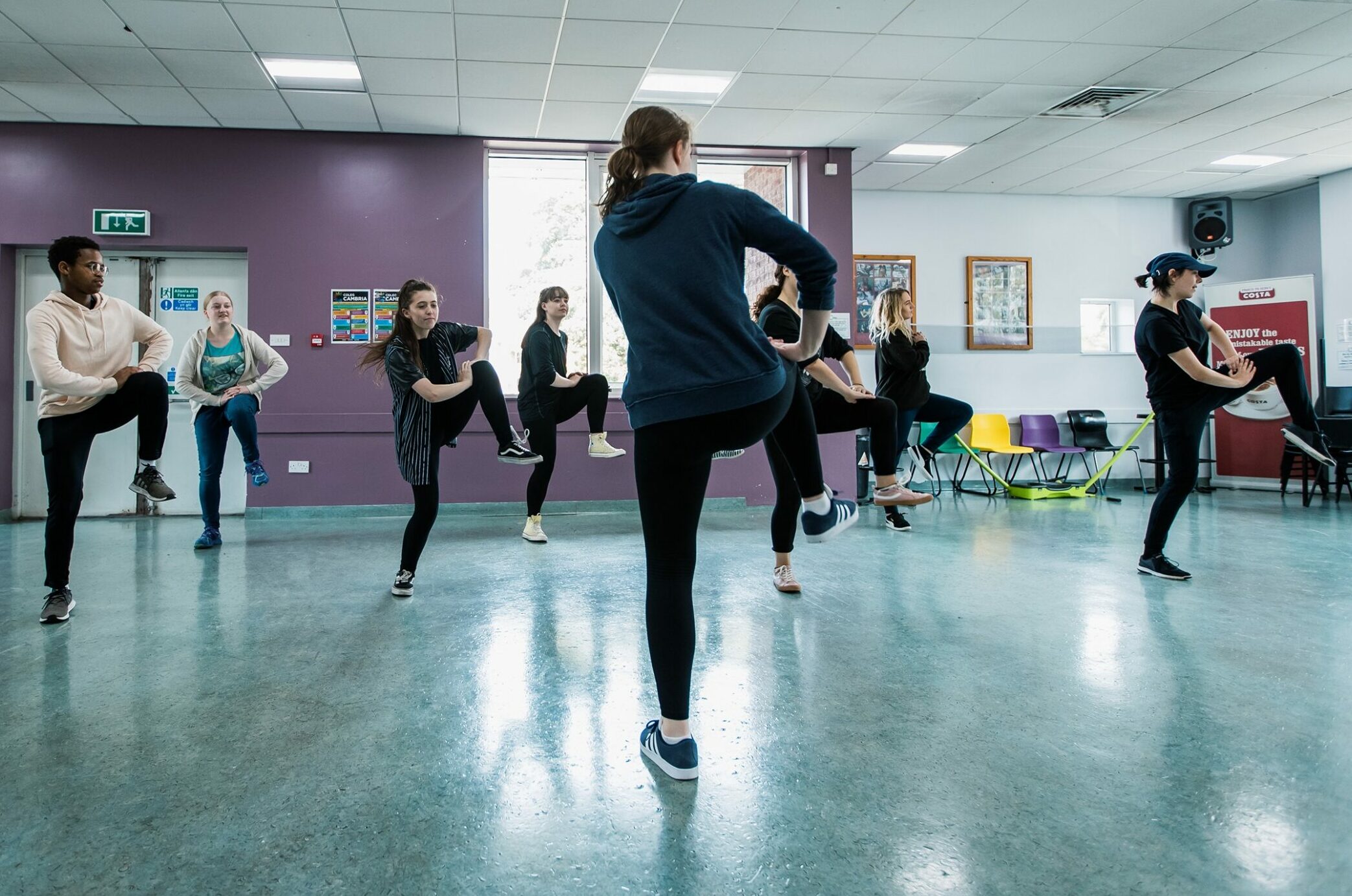 A group of students partaking in a fitness club.