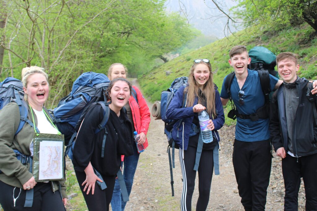 A group of happy students about to start a hike as part of their Duke of Edinburgh Awards