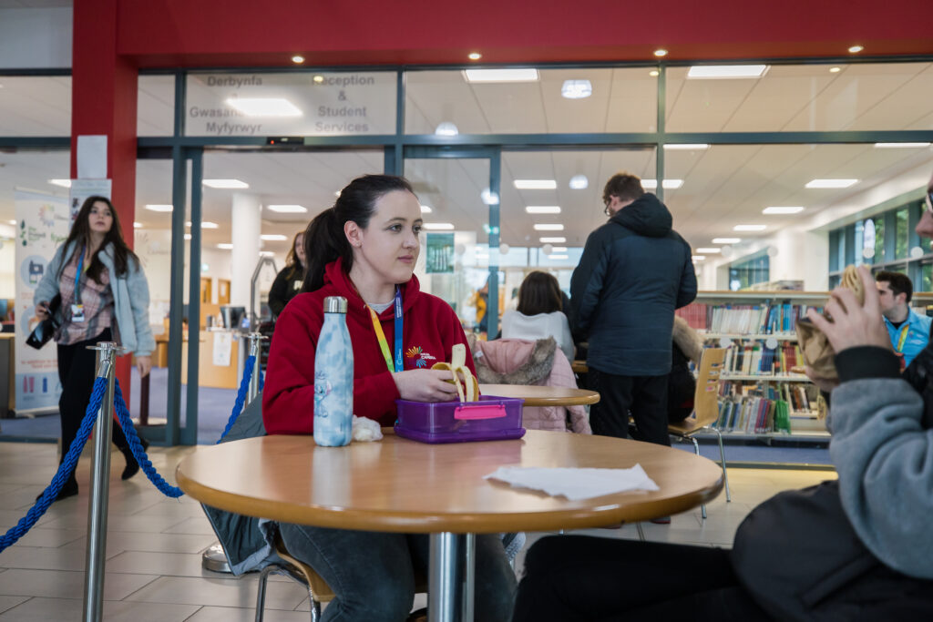 a learner sat at a table