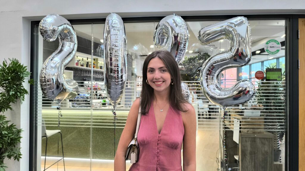 NIAMH JONES stood in front of balloons