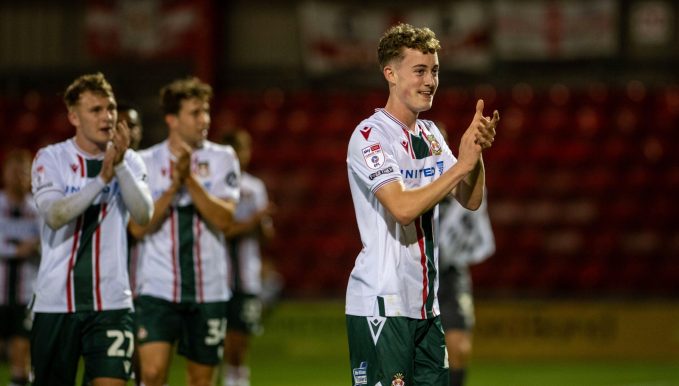 A COLEG CAMBRIA student is on cloud nine after making his Wrexham AFC debut