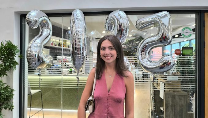 NIAMH JONES stood in front of balloons